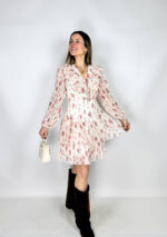 Abito da donna in fantasia floreale. Raffinato ed elegante.